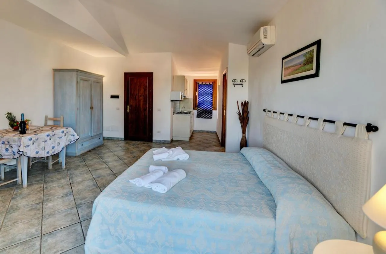 Aparthotel Isa-Apartments: Seaside Residence with Pool and Private Outdoor Space Palau Italy